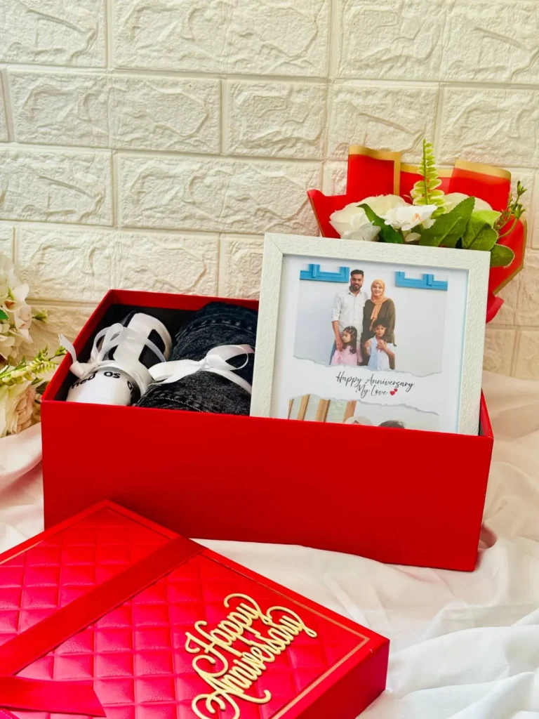 Anniversary customized gift hampers with personalized photo frame and curated gifts